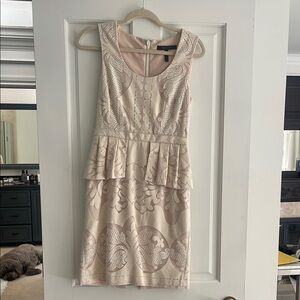 Elegant Cream Lace peplum
Mini Dress BCBG size 4